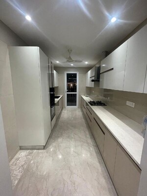 Kitchen in 4 BHK Builder Floor at Ansal API Versalia, Sector 67a – for Sale
