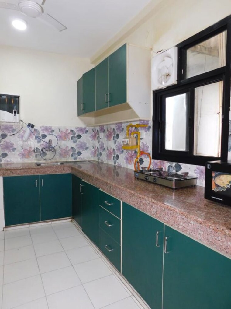 Kitchen, crossing-chitravan 2 Bedroom 125 Sq.Ft. Builder Floor In Nai Basti Dundahera Ghaziabad 10390673
