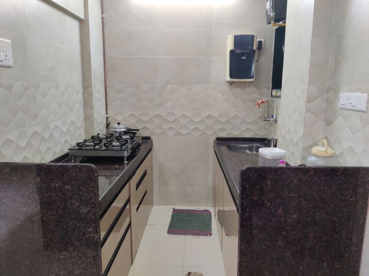 Kitchen, lodha-amara 2 Bedroom 650 Sq.Ft. Apartment In Kolshet Road Thane 10390676