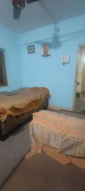 Bedroom in 1 BHK Apartment at Adarsha Priyadarshini CHS, Kalwa – for Rent
