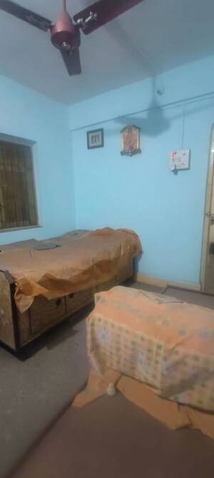 Bedroom in 1 BHK Apartment at Adarsha Priyadarshini CHS, Kalwa – for Rent