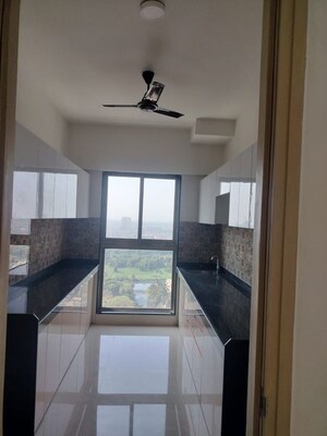 Kitchen in 2 BHK Apartment at Rajesh Raj Infinia, Malad West – for Rent