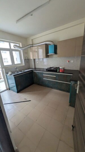 Kitchen in 4 BHK Apartment at Orris Aster Court Premier, Sector 85 – for Rent