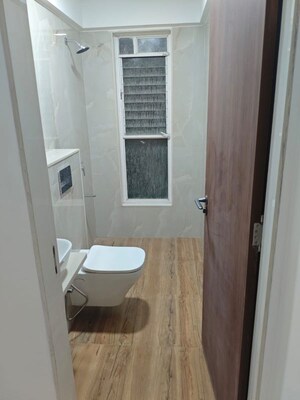 Bathroom in 3 BHK Apartment at Mainland Eternia, Lulla Nagar – for Rent