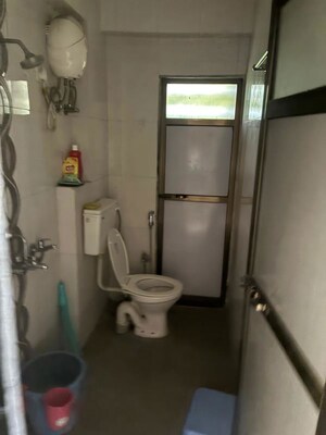 Bathroom in 2 BHK Apartment at K M Horizon Palms, Owale – for Rent