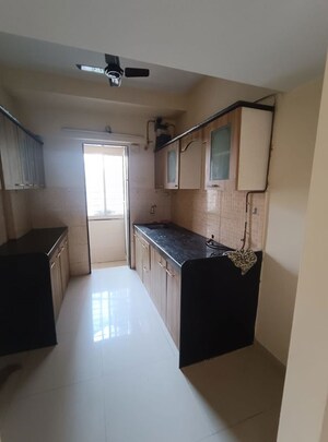 Kitchen in 2 BHK Apartment at Bhoomi Acres, Thane West – for Rent