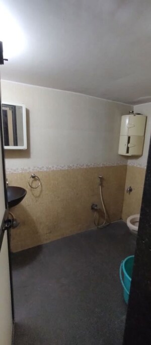 Bathroom in 1 BHK Apartment at dhake colony, Andheri West – for Rent