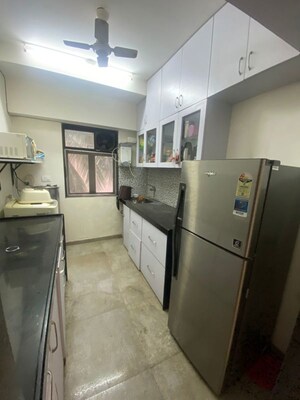 Kitchen in 2 BHK Apartment at Ira Chhaya Apartment, Santacruz West – for Sale