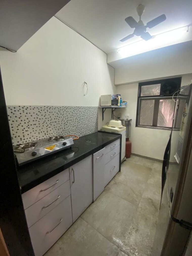 Kitchen, ira-chhaya-apartment 2 Bedroom 735 Sq.Ft. Apartment In Santacruz West Mumbai 10390910