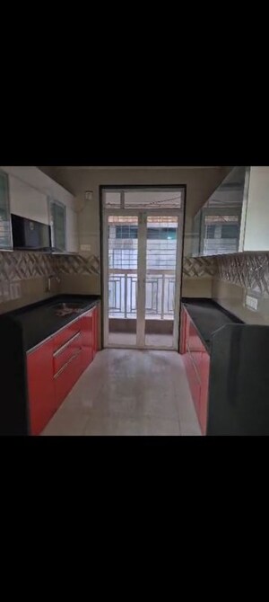 Kitchen in 2 BHK Apartment at Unique Seasons One, Khadakpada – for Sale