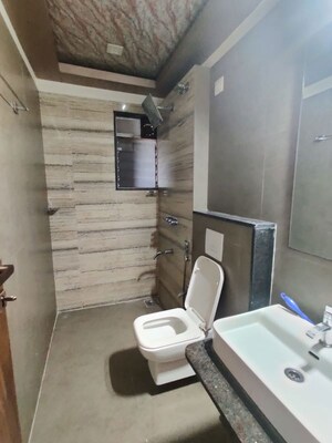 Bathroom in 2 BHK Apartment at Siddhi Highland Haven, Balkum Pada – for Rent