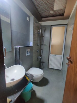 Bathroom in 2 BHK Apartment at Siddhi Highland Haven, Balkum Pada – for Rent