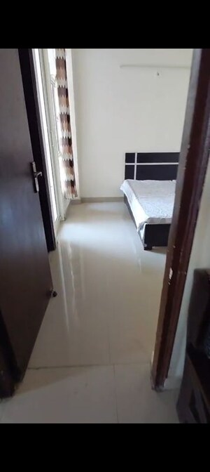 Bedroom in 2 BHK Apartment at JKG Palm Resort, Raj Nagar Extension – for Rent
