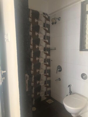 Bathroom in 1 BHK Apartment at Keemaya Vedic Heights, Kandivali East – for Rent