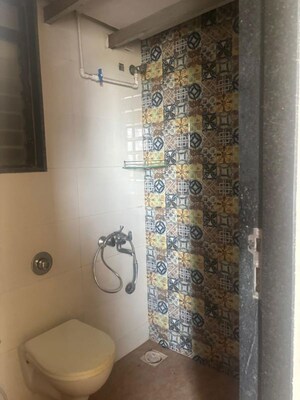 Bathroom in 1 BHK Apartment at Keemaya Vedic Heights, Kandivali East – for Rent