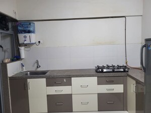 Kitchen in 2 BHK Apartment at Paranjape Blue Ridge, Hinjewadi – for Rent