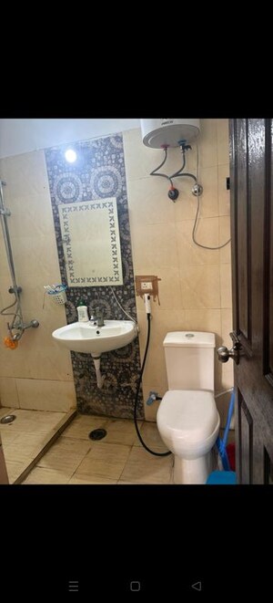 Bathroom in 2 BHK Apartment at Prateek Laurel, Sector 120 – for Rent