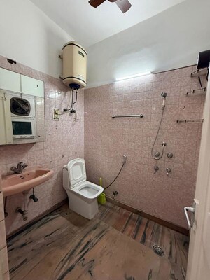 Bathroom in 3 BHK Builder Floor at Nehru Enclave – for Rent