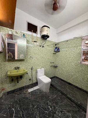 Bathroom in 3 BHK Builder Floor at Nehru Enclave – for Rent