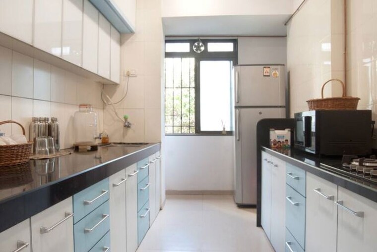 Kitchen, marathon-monte-south 2 Bedroom 850 Sq.Ft. Apartment In Byculla West Mumbai 10391196