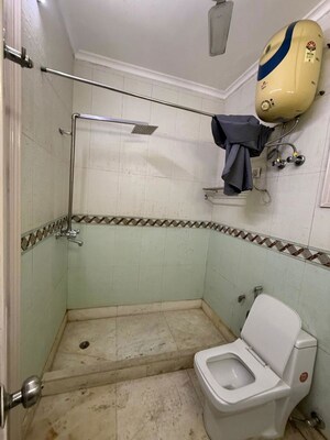 Bathroom in 4 BHK Builder Floor at Pamposh Enclave – for Rent