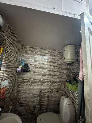 Bathroom in 2 BHK Builder Floor at Kalkaji – for Rent