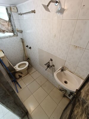 Bathroom in 1 BHK Apartment at Mangal Orchid Chs, Andheri West – for Rent
