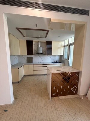Kitchen in 3.5 BHK Penthouse at Mahagun Mezzaria, Sector 78 – for Rent