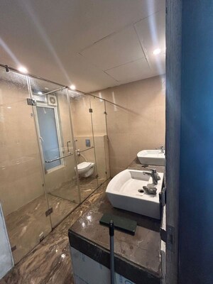 Bathroom in 3.5 BHK Penthouse at Mahagun Mezzaria, Sector 78 – for Rent