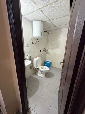 Bathroom in 2.5 BHK Apartment at Aims Golf City, Sector 75 – for Rent
