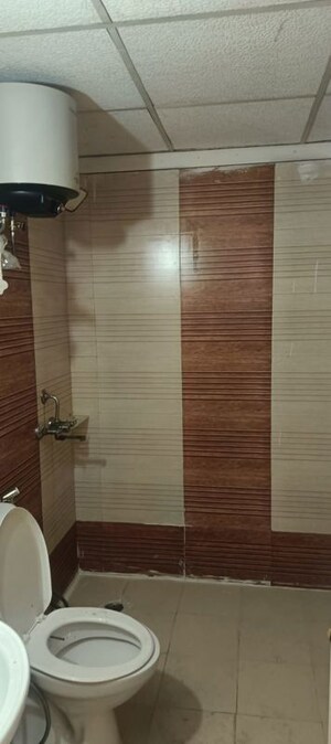 Bathroom in 2 BHK Apartment at Aims Golf City, Sector 75 – for Rent