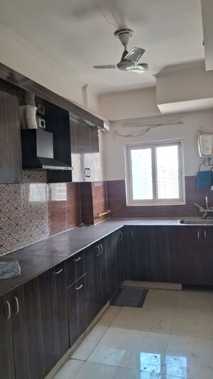 Kitchen in 3 BHK Apartment at Amrapali Silicon City, Sector 76 – for Rent