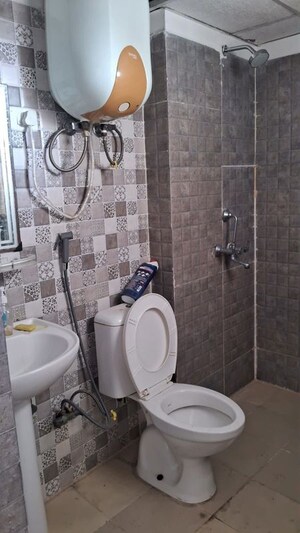 Bathroom in 3 BHK Apartment at Amrapali Silicon City, Sector 76 – for Rent