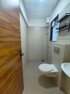 Bathroom in 3 BHK Apartment at Je And Vee Om Trimurti, Malad East – for Sale