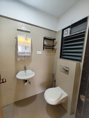 Bathroom in 3 BHK Apartment at Je And Vee Om Trimurti, Malad East – for Sale