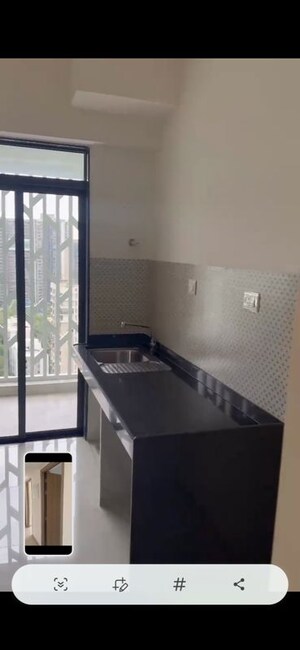 Kitchen in 3 BHK Apartment at Lodha Woods, Kandivali East – for Sale