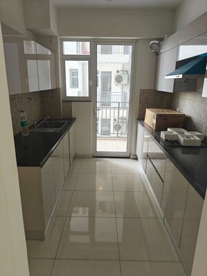 Kitchen in 2 BHK Apartment at Godrej Woods, Sector 43 – for Rent