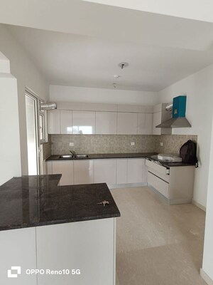Kitchen in 4 BHK Apartment at Godrej Woods, Sector 43 – for Rent
