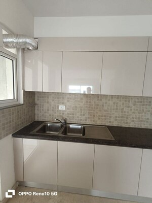Kitchen in 4 BHK Apartment at Godrej Woods, Sector 43 – for Rent