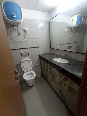 Bathroom in 3 BHK Apartment at Godrej Woods, Sector 43 – for Rent