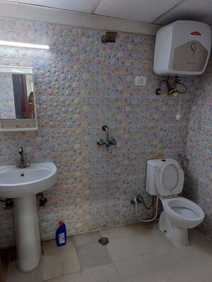 Bathroom in 3 BHK Apartment at Antriksh Golf View, Sector 78 – for Rent