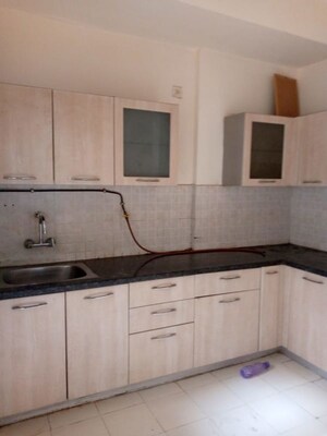 Kitchen in 3.5 BHK Apartment at Prateek Wisteria, Sector 77 – for Rent