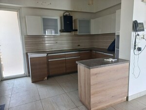 Kitchen in 4 BHK Apartment at ABA Cleo County, Sector 121 – for Rent