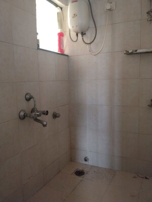 Bathroom in 3 BHK Apartment at Lokhandwala Complex – for Rent