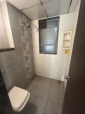 Bathroom in 2 BHK Apartment at Saarrthi Skybay, Mahalunge – for Rent