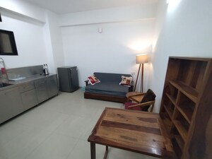 Living Room in Studio Apartment at Dlf City Phase 3 – for Rent