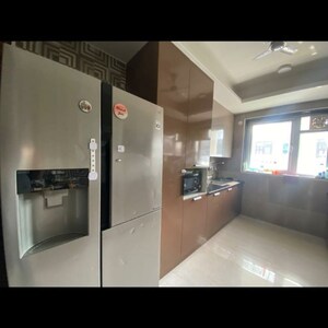Kitchen in 2 BHK Apartment at Raheja Vedaanta, Sector 108 – for Rent