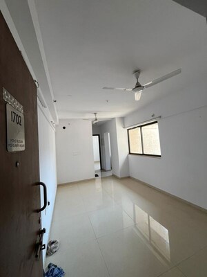Living Room in 1 BHK Apartment at Lodha Downtown, Dombivli East – for Rent