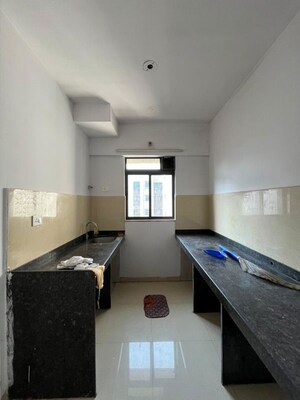 Kitchen in 1 BHK Apartment at Lodha Downtown, Dombivli East – for Rent