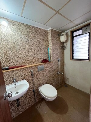 Bathroom in 1 BHK Apartment at Lodha Downtown, Dombivli East – for Rent